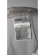 La garantie Once Again : 562420 vêtements d'occasion de marque en état irréprochable.