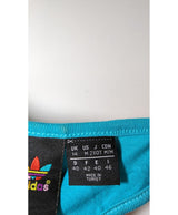 La garantie Once Again : 562436 vêtements d'occasion de marque en état irréprochable.