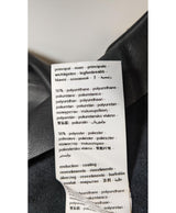 La garantie Once Again : 562469 vêtements d'occasion de marque en état irréprochable.