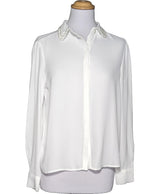 La garantie Once Again : 562489 vêtements d'occasion de marque en état irréprochable.