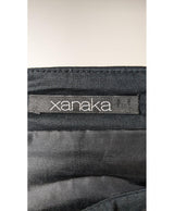 La garantie Once Again : 562546 vêtements d'occasion de marque en état irréprochable.