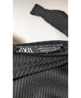 La garantie Once Again : 562563 vêtements d'occasion de marque en état irréprochable.