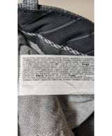 La garantie Once Again : 562581 vêtements d'occasion de marque en état irréprochable.