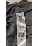 La garantie Once Again : 562639 vêtements d'occasion de marque en état irréprochable.