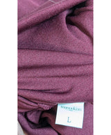 La garantie Once Again : 562871 vêtements d'occasion de marque en état irréprochable.