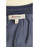 La garantie Once Again : 562884 vêtements d'occasion de marque en état irréprochable.