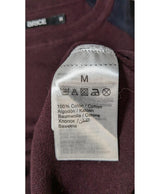 La garantie Once Again : 563118 vêtements d'occasion de marque en état irréprochable.