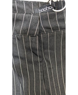La garantie Once Again : 563185 vêtements d'occasion de marque en état irréprochable.