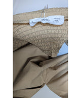 La garantie Once Again : 563199 vêtements d'occasion de marque en état irréprochable.