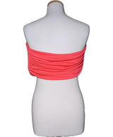 La garantie Once Again : 563227 vêtements d'occasion de marque en état irréprochable.