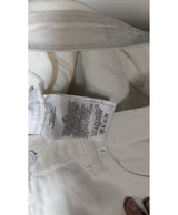 La garantie Once Again : 563305 vêtements d'occasion de marque en état irréprochable.