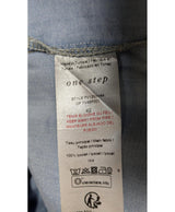 La garantie Once Again : 563366 vêtements d'occasion de marque en état irréprochable.