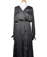 La garantie Once Again : 563457 vêtements d'occasion de marque en état irréprochable.