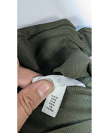 La garantie Once Again : 563492 vêtements d'occasion de marque en état irréprochable.