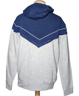 La garantie Once Again : 563527 vêtements d'occasion de marque en état irréprochable.
