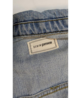 La garantie Once Again : 563543 vêtements d'occasion de marque en état irréprochable.