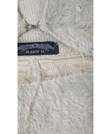 La garantie Once Again : 563582 vêtements d'occasion de marque en état irréprochable.