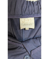 La garantie Once Again : 563624 vêtements d'occasion de marque en état irréprochable.