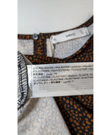 La garantie Once Again : 563769 vêtements d'occasion de marque en état irréprochable.