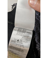 La garantie Once Again : 563811 vêtements d'occasion de marque en état irréprochable.