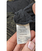 La garantie Once Again : 563830 vêtements d'occasion de marque en état irréprochable.