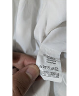 La garantie Once Again : 563920 vêtements d'occasion de marque en état irréprochable.
