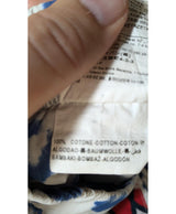 La garantie Once Again : 564236 vêtements d'occasion de marque en état irréprochable.