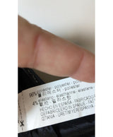 La garantie Once Again : 564256 vêtements d'occasion de marque en état irréprochable.