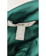 La garantie Once Again : 564313 vêtements d'occasion de marque en état irréprochable.