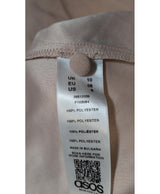 La garantie Once Again : 564375 vêtements d'occasion de marque en état irréprochable.