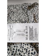 La garantie Once Again : 564457 vêtements d'occasion de marque en état irréprochable.