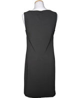 La garantie Once Again : 564467 vêtements d'occasion de marque en état irréprochable.