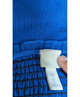 La garantie Once Again : 564826 vêtements d'occasion de marque en état irréprochable.