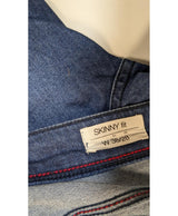 La garantie Once Again : 564895 vêtements d'occasion de marque en état irréprochable.