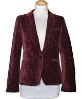 La garantie Once Again : 564925 vêtements d'occasion de marque en état irréprochable.