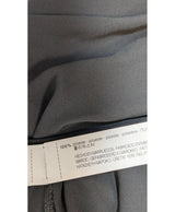 La garantie Once Again : 564927 vêtements d'occasion de marque en état irréprochable.