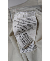 La garantie Once Again : 564974 vêtements d'occasion de marque en état irréprochable.