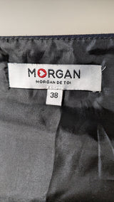 La garantie Once Again : 565163 vêtements d'occasion de marque en état irréprochable.