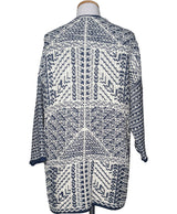 La garantie Once Again : 565228 vêtements d'occasion de marque en état irréprochable.
