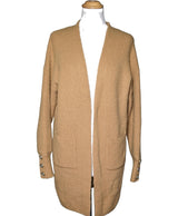 La garantie Once Again : 565247 vêtements d'occasion de marque en état irréprochable.