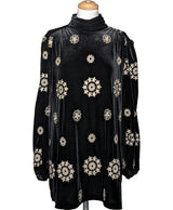 La garantie Once Again : 565586 vêtements d'occasion de marque en état irréprochable.