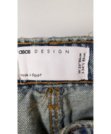 La garantie Once Again : 565739 vêtements d'occasion de marque en état irréprochable.