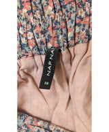 La garantie Once Again : 565877 vêtements d'occasion de marque en état irréprochable.