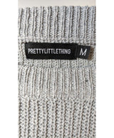 La garantie Once Again : 566001 vêtements d'occasion de marque en état irréprochable.