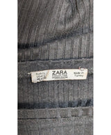 La garantie Once Again : 566281 vêtements d'occasion de marque en état irréprochable.