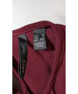 La garantie Once Again : 566415 vêtements d'occasion de marque en état irréprochable.
