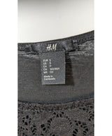 La garantie Once Again : 566463 vêtements d'occasion de marque en état irréprochable.
