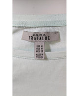 La garantie Once Again : 566473 vêtements d'occasion de marque en état irréprochable.