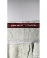 La garantie Once Again : 566545 vêtements d'occasion de marque en état irréprochable.
