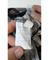 La garantie Once Again : 566825 vêtements d'occasion de marque en état irréprochable.